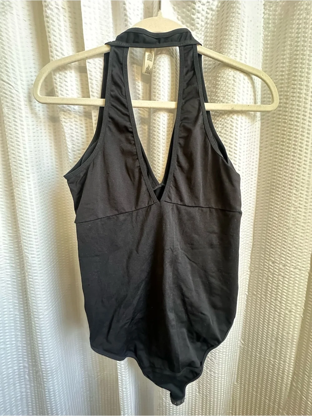 Nicole Miller Black Sleeveless Keyhole Back Body suit.